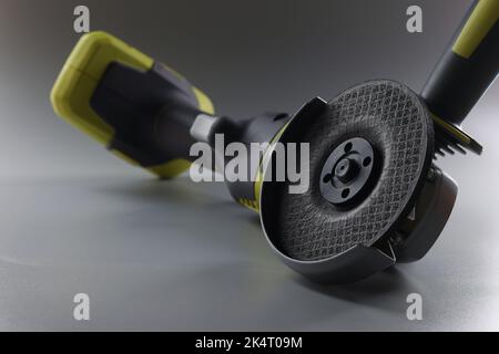 Cordless new hand sander on a gray background Stock Photo