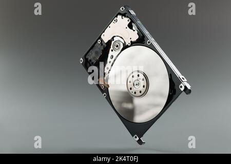 New hard drive pc a gray background, close-up Stock Photo