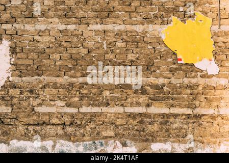 Texture of an old mud-brick wall as background and copy space Stock Photo