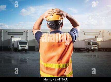 Asian worker or engineer work with problem at warehouse Stock Photo