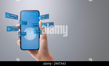 Woman holding her smartphone and using an augmented reality navigation app Stock Photo