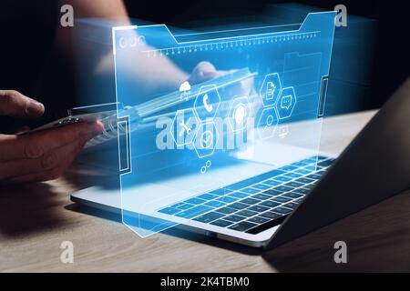 The concept of remote support and assistance for customer service. The person works at the computer. Stock Photo
