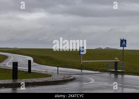 lowered barrier at the checkpoint on the road Stock Photo