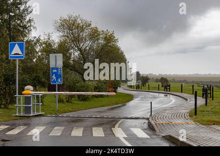 lowered barrier at the checkpoint on the road Stock Photo