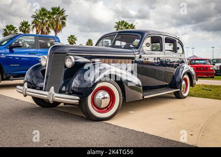 Daytona Beach, FL - November 28, 2020: Low perspective front corner view of a 1937 Buick Century Series 60 Model 64 Touring Sedan at a local car show. Stock Photo
