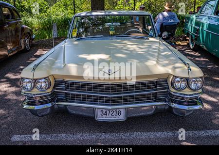 Falcon Heights, MN - June 18, 2022: High perspective front view of a 1963 Cadillac Series 62 Coupe De Ville at a local car show. Stock Photo