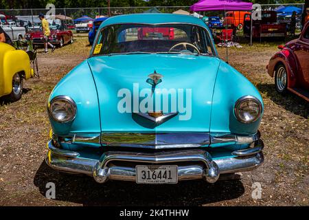 Falcon Heights, MN - June 18, 2022: High perspective front view of a 1953 Kaiser Manhattan 4 Door Sedan at a local car show. Stock Photo