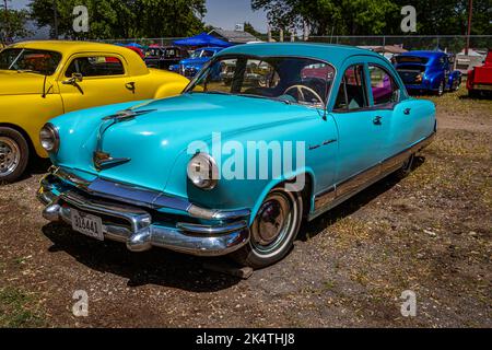 Falcon Heights, MN - June 18, 2022: High perspective front corner view of a 1953 Kaiser Manhattan 4 Door Sedan at a local car show. Stock Photo