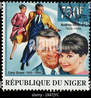 Audrey Hepburn and Cary Grant on postage stamp Stock Photo