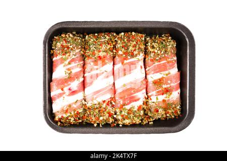 Raw mixture meat sausages - traditional Balkan food cevapcici or Romanian mititei ready for grilling. Minced meat rolls wrapped with bacon and spices Stock Photo