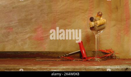 Wine and champagne corks, corkscrew and red leafs on a grungy background. Wine and autumn concept, free copy space. Stock Photo