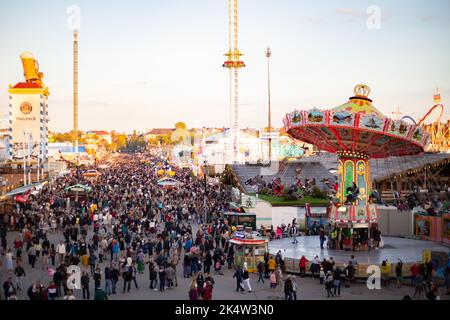 Munich, Germany. 03rd Oct, 2022. Hundreds of thousands visit the Oktoberfest 2022 on October 3rd, 2022 in Munich, Germany. As the weather was cold and/or wet all over the this year's Wiesn many stayed at home. On the last day as the sund was shining the Oktoberfest was crowded again. (Photo by Alexander Pohl/Sipa USA) Credit: Sipa USA/Alamy Live News Stock Photo