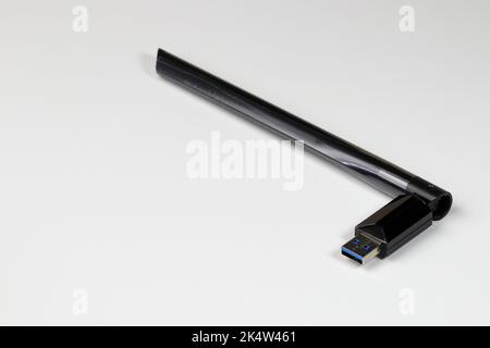USB wifi adapter, USB wireless network card, wireless internet usb adapter isolate on white background. Stock Photo