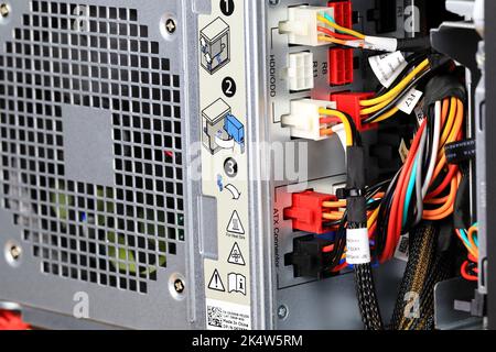 Modular power supply with cables for desktop pc or workstation, Detail of Power Supply Unit (PSU) wiring, Computer part for system unit assembly. Stock Photo