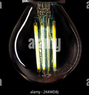 Close-Up of an illuminated LED light bulb Stock Photo