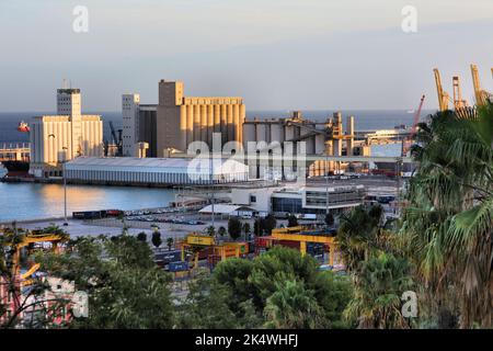 BARCELONA, SPAIN - OCTOBER 6, 2021: Grain silos in the Port of Barcelona. It is one of busiest ports in Europe. Stock Photo