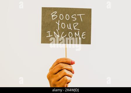 Text caption presenting Boost Your Income. Business overview improve your business to increase revenue or profit Stock Photo