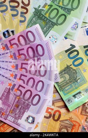 Euro money banknotes background. European paper money texture with 50, 100, 200 and 500 euros bills. Stock Photo