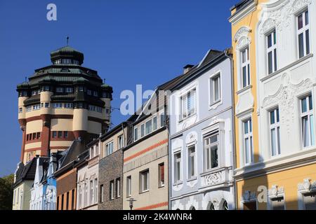 Moenchengladbach city in Germany. Street view with monumental Water Tower (Wasserturm). Stock Photo