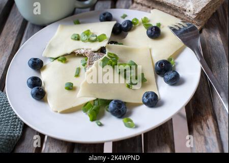 Crispbread sandwich with cheese. Made with low carb fiber bread Stock Photo