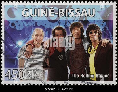 Portrait of the Rolling Stones on postage stamp of Guinea Bissau Stock Photo