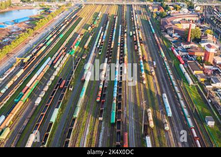 Trains from above. Aerial Top view to railway cylindrical tank shipping containers Rail way. Striped creative transport industry representation. railr Stock Photo