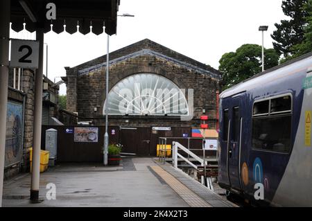 The remaining one of a pair of fan glass window at Buxton Station in the Derbyshire Peak District viewed from the platform. The window dates from 1863 Stock Photo