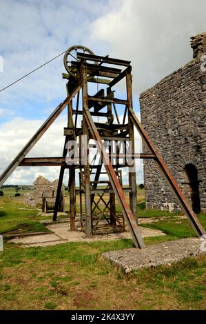 The steel headgear and cage at the Magpie Mine near Sheldon, Derbyshire. It dates from the 1950s, when the mine was last in commercial production. Stock Photo