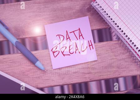 Handwriting text Data Breach. Business concept unauthorized release of confidential and secured details Stock Photo