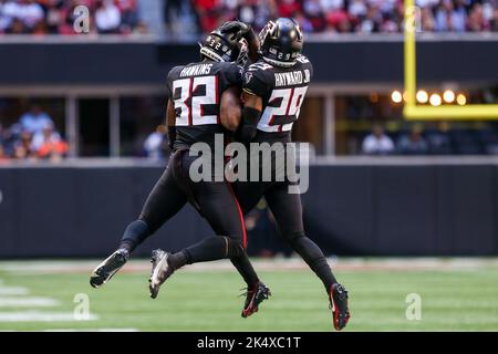 Atlanta Falcons' Jaylinn Hawkins (right) makes an interception during the  match which is part of the NFL London Games at Tottenham Hotspur Stadium,  London. Picture date: Sunday October 10, 2021 Stock Photo - Alamy