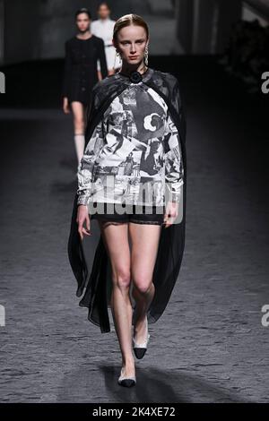 Paris, France. 07th Mar, 2022. Model Rianne Van Rompaey walks on