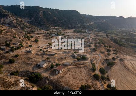 Aerial view of the Turkish Cypriot village of Souskiou (Susuz) in the Diarizos Valley, Paphos region,  Cyprus. The village was abandoned in July 1974. Stock Photo