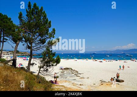 Tourists on the famous Playa de Rodas beach, Cies Islands,Galicia, Spain. Stock Photo