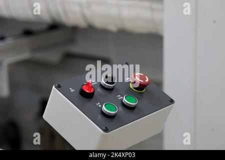 Remote control console of industrial equipment. Selective focus. Stock Photo