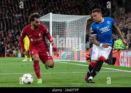 Liverpool, UK. 04th Oct, 2022. James Tavernier #2 of Rangers and Mohamed Salah #11 of Liverpool battle for the ball during the UEFA Champions League match Liverpool vs Rangers at Anfield, Liverpool, United Kingdom, 4th October 2022 (Photo by James Heaton/News Images) Credit: News Images LTD/Alamy Live News Stock Photo