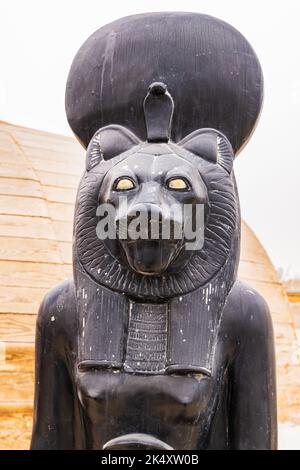 Egyptian statue of goddess Sekhmet with head of lion, historical stone ...