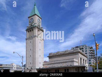 Toronto, Ontario, Canada - October 2022:  A former passenger railway station with a clocktower built in 1916 has been repurposed as an LCBO liquor sto Stock Photo