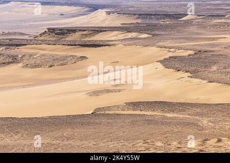 Wadi al Hitan, Faiyum, Egypt. Sandy desert at Wadi el-Hitan paleontological site. Stock Photo