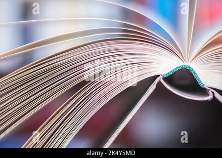 Opened book pages with soft blurred background, macro view Stock Photo
