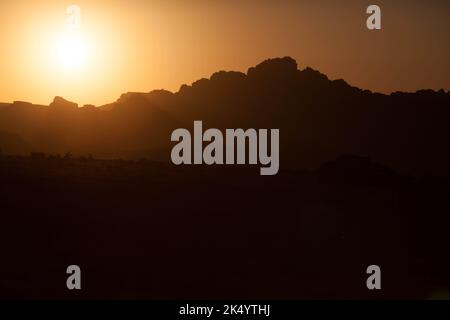 Sunset over the Wadi Rum Desert in Jordan Stock Photo