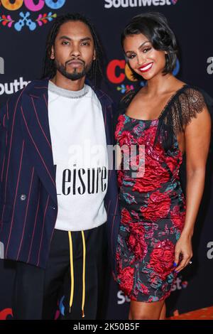 (FILE) Singer Miguel's Wife Nazanin Mandi Files For Divorce After Almost 4 Years Of Marriage. In court documents obtained by PEOPLE on Tuesday, October 4, 2022 Mandi, 36, filed for divorce from Miguel, also 36, in the Superior Court of California in Los Angeles County. HOLLYWOOD, LOS ANGELES, CALIFORNIA, USA - NOVEMBER 08: American singer Miguel (Miguel Jontel Pimentel) and fiance/American actress Nazanin Mandi (Nazanin Aliza Mandighomi Pimentel) arrive at the Los Angeles Premiere Of Disney Pixar's 'Coco' held at the El Capitan Theatre on November 8, 2017 in Hollywood, Los Angeles, California, Stock Photo