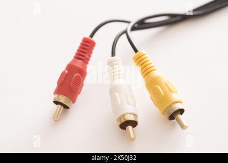 Close-up view of RCA cable connector for video and two audio stereo channels on white background Stock Photo