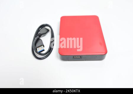 Isolated external hard drive or hard disk or HDD on white background. Stock Photo