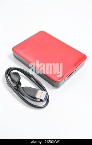 Isolated external hard drive or hard disk or HDD on white background. Stock Photo