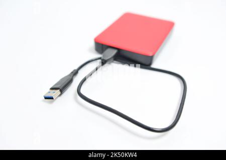 Isolated external hard drive or hard disk or HDD on white background. Stock Photo