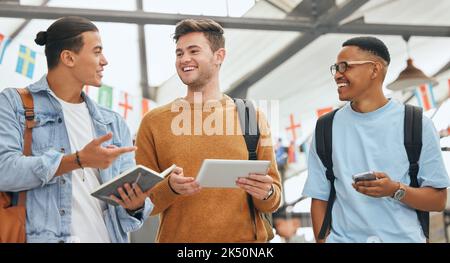 Student, friends and talking of university happy students diversity together using technology. Smile and speaking man friend group with happiness at Stock Photo