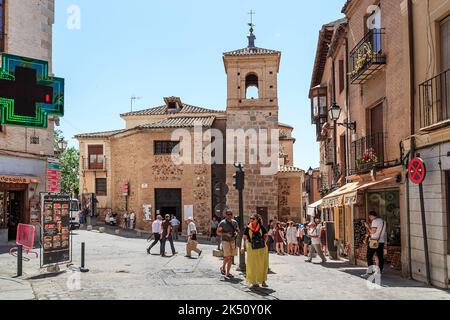 TOLEDO, SPAIN - MAY 25, 2017: This is the Plaza del Salvador on which comes the bell tower and apse of the church of Santo Tome. Stock Photo