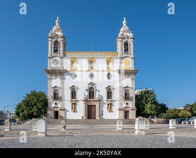 Faro, Portugal, September 2022: View on Igreja do Carmo, home of Capela dos Ossos de Faro or Chapel of Bones. Stock Photo