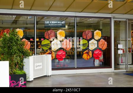 Alain Ducasse shop for chocolates and ice cream under the canopy at Les Halles in the 1st Arrondissement, Paris, France. Stock Photo