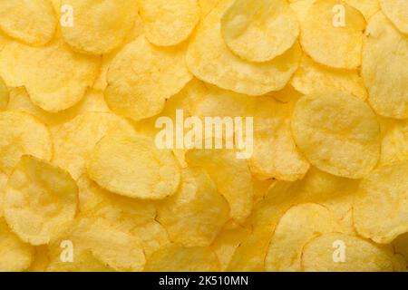 Natural potato chips texture top view pattern background Stock Photo